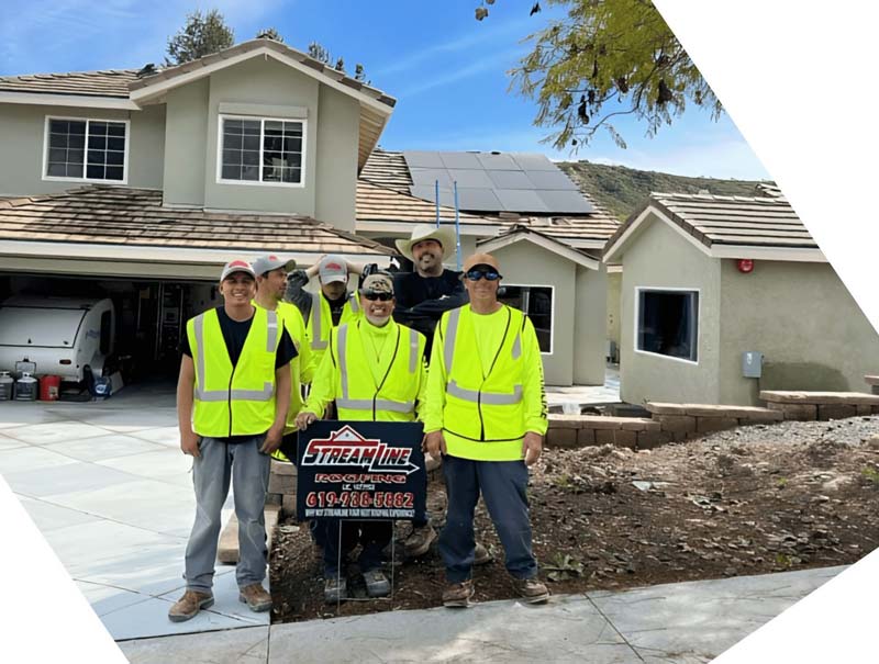 Team of Streamline Roofing standing in front of a house in the San Diego area