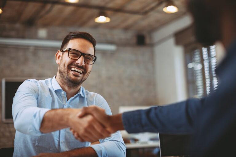 handshake over desk