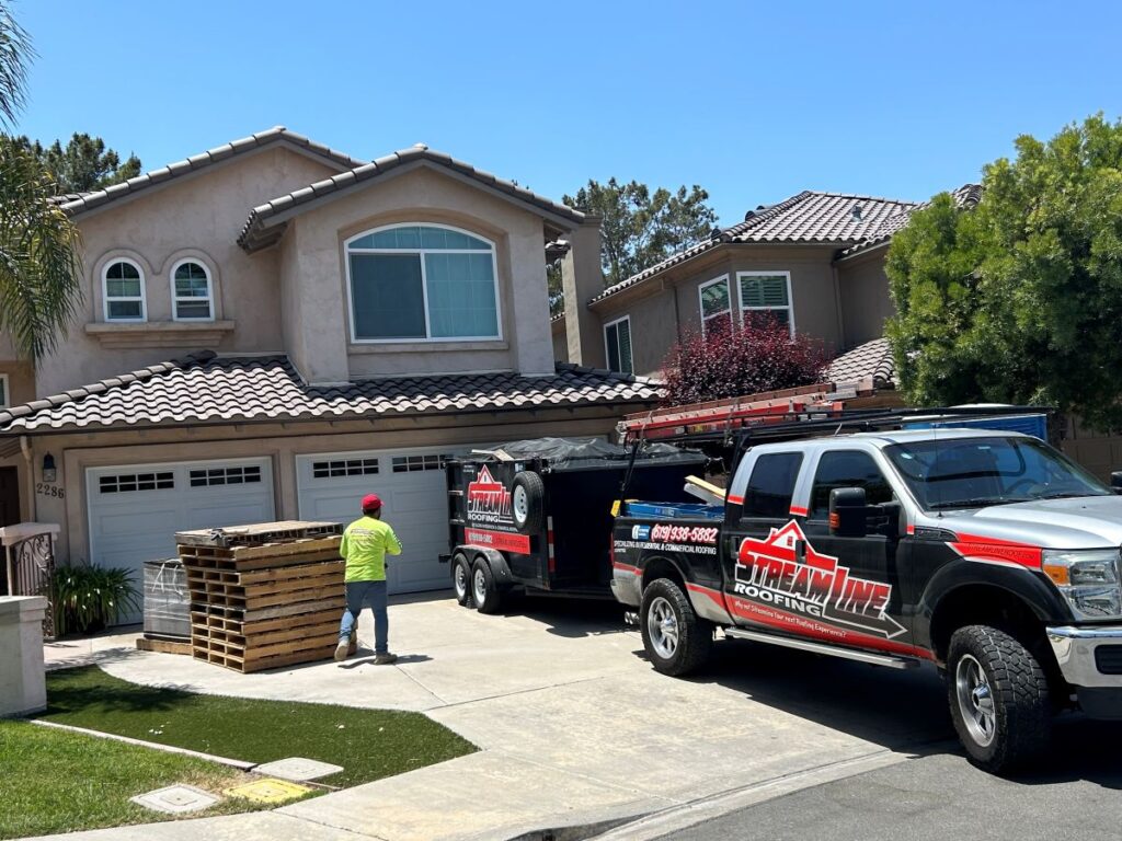 residential roofing contractors Streamline branded trucks big house