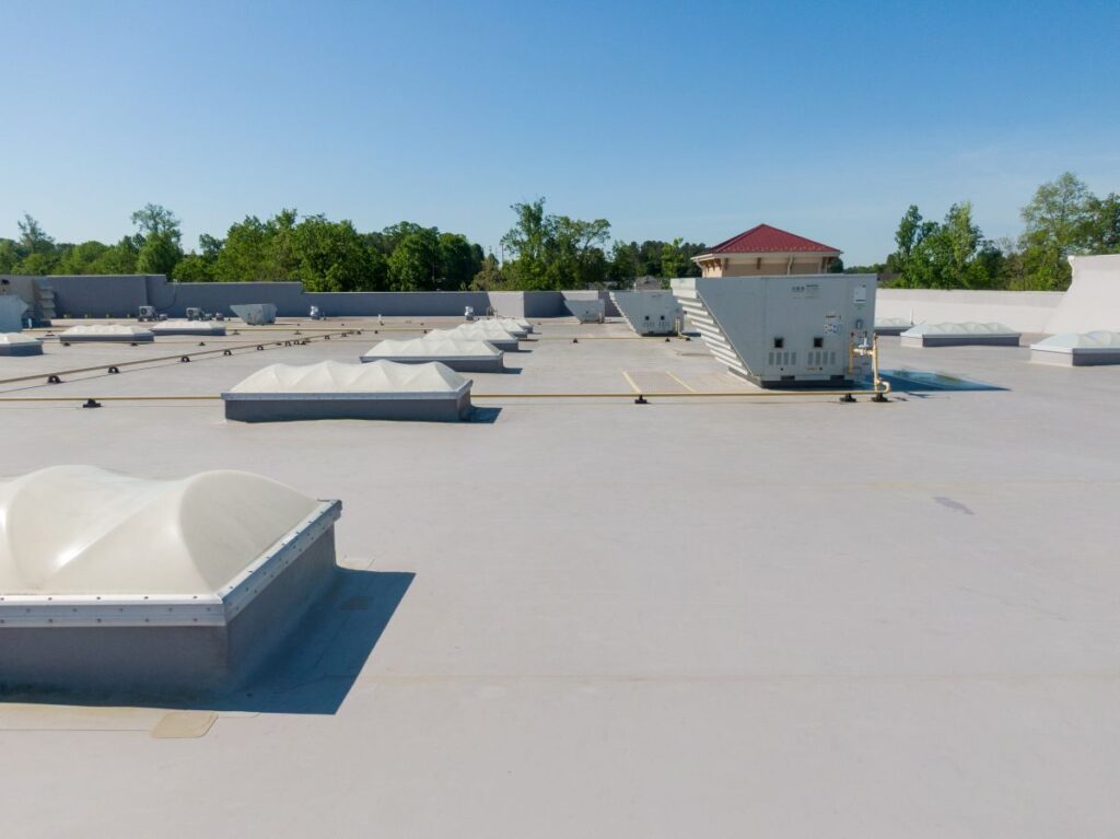 tpo roofing installation white commercial building