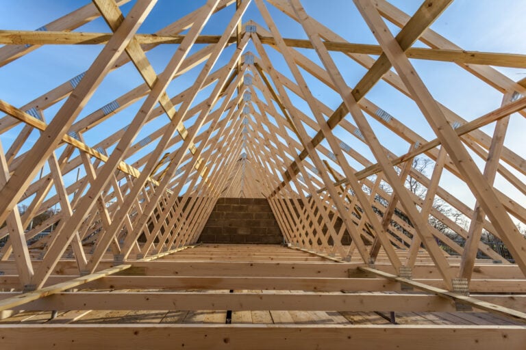 roof truss wooden structure under blue sky