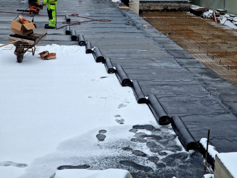 guy installing new roof