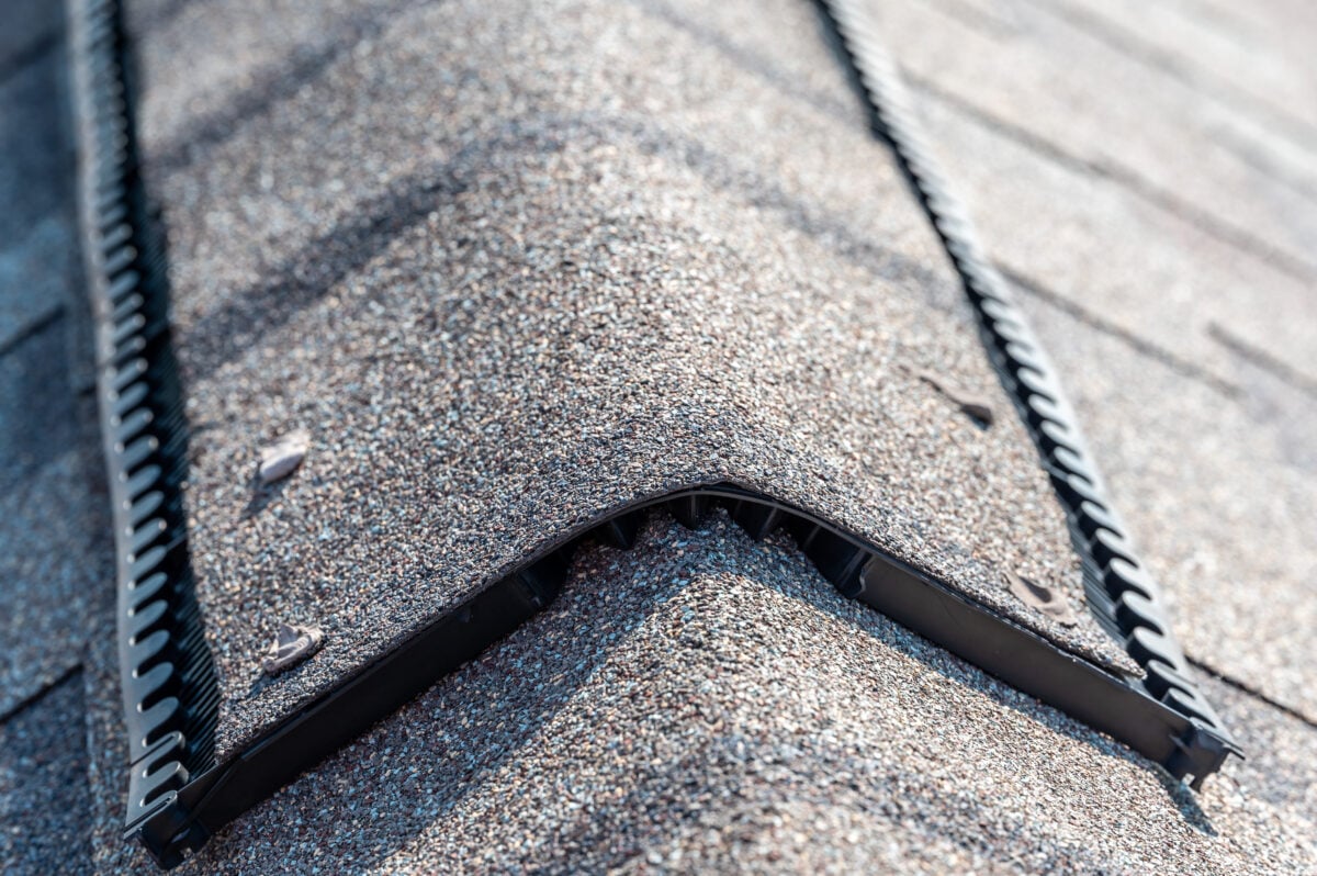 typical Ridge cap vent installed on a shingle roof for passive attic ventilation roof ridge